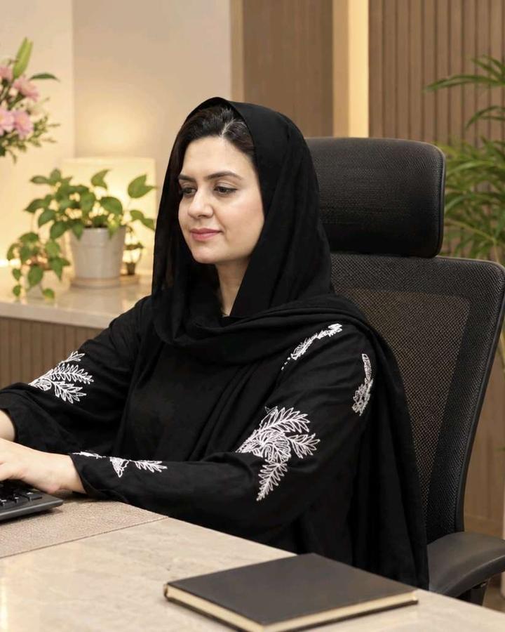 Zaineb Danish working at her desk